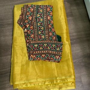 Beautiful gold color saree with blouse